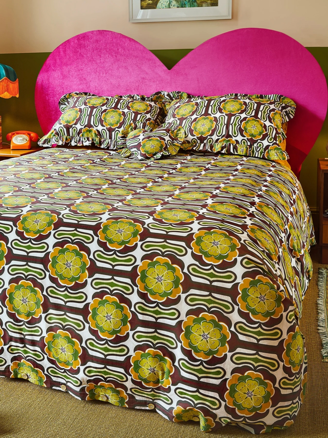Thelma Duvet Cover. A green, black, white and brown duvet cover.