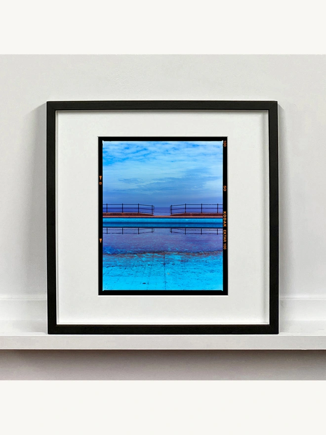 Craig y Don Pool mounted square framed in black