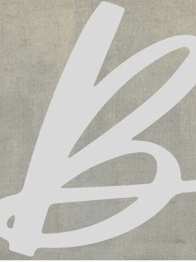 Hand Painted Alphabet Initials Linen Table Napkins, an initial napkin lying on a plain surface. 