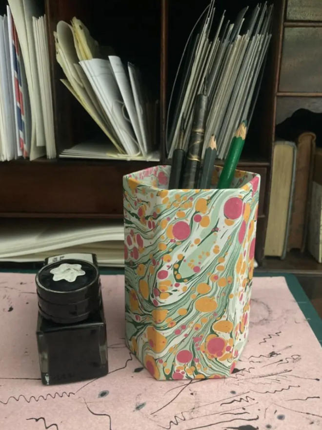 Pen Pot. A green pen pot.