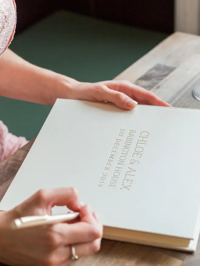 Super-Smart Personalised Wedding Memory Book about to be opened and written in. 
