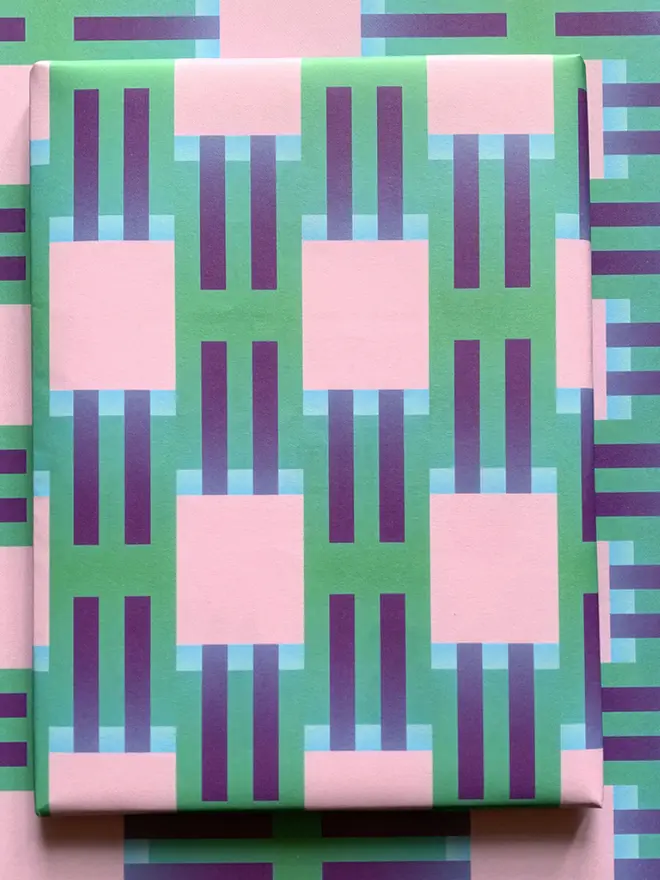 Geometric Column Pattern Wrapping Paper, against a patterned background. 