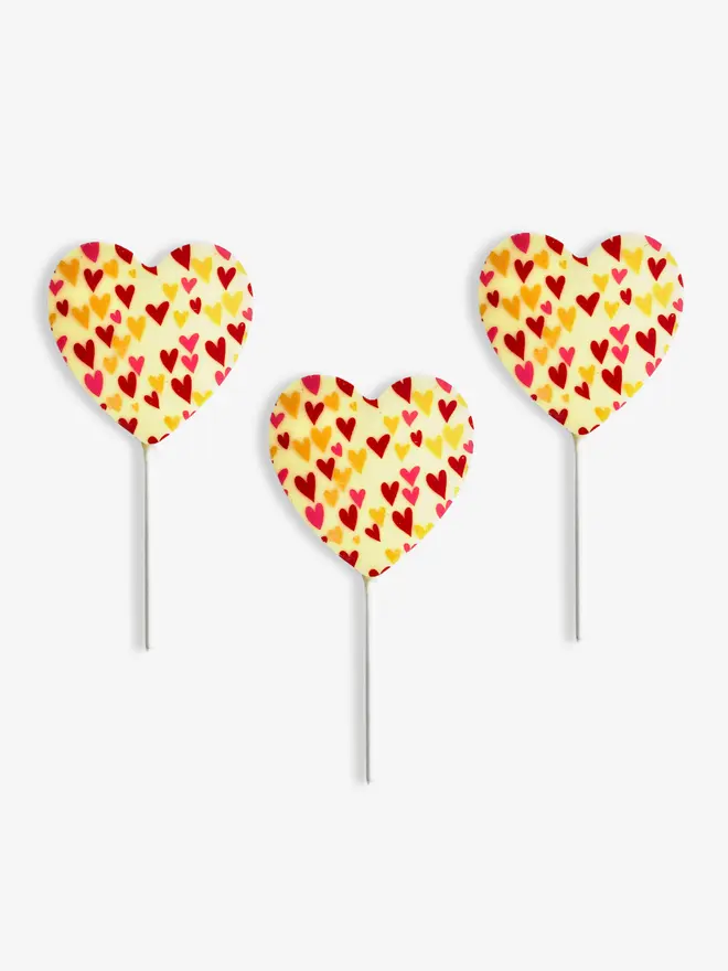 Three white chocolate heart-shaped lollipops for Valentine's Day