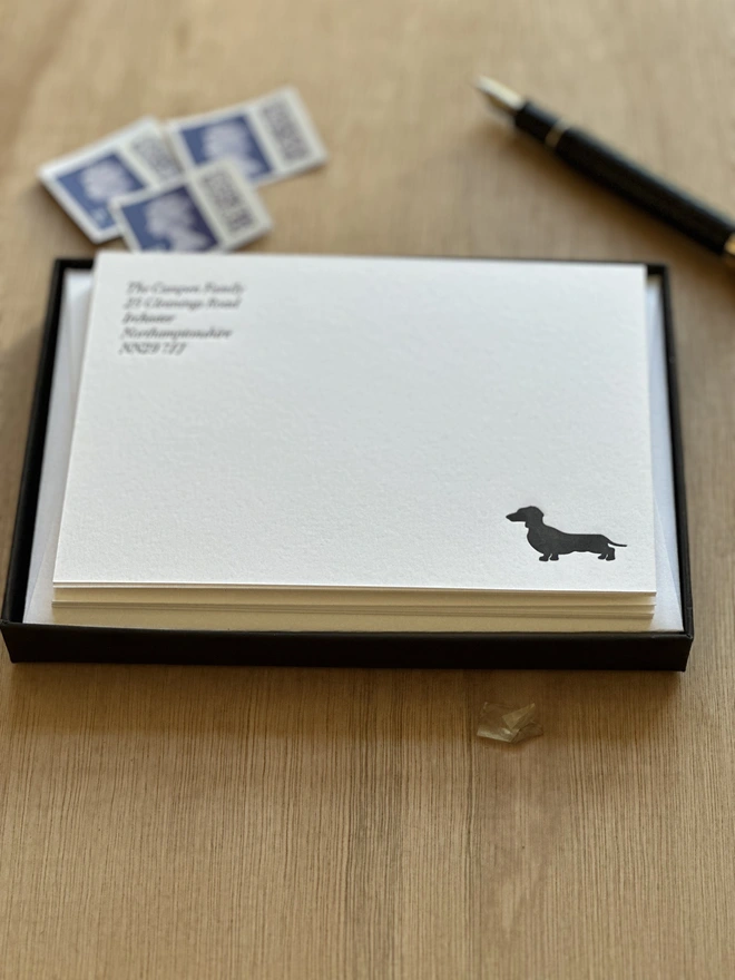 Dachshund notecard set in box with black Dachshund in bottom right corner and address in top left corner