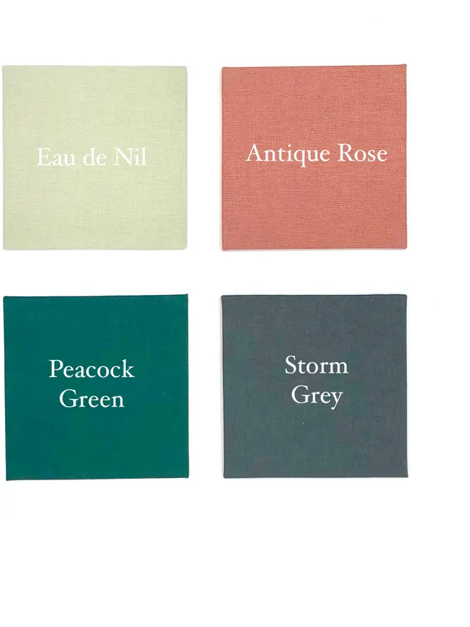 Four squares of coloured linen shows the available shades for a Golden Orb diary.
