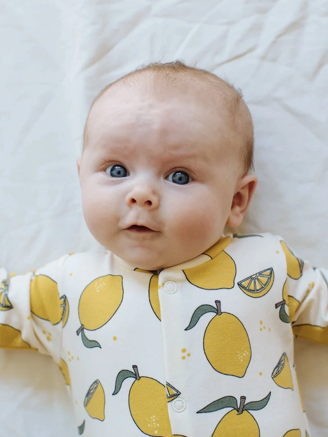 Organic Cotton Baby Sleepsuit in Cream " Lemon Grove " print