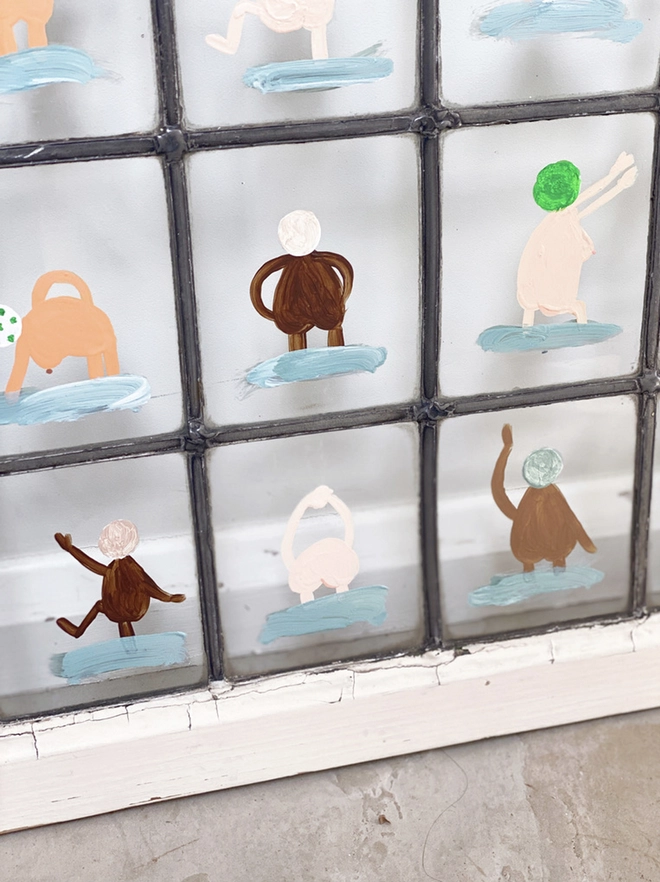 18 whimsical swimmers painted on old window stretching in the nude. Funny, quirky and playful