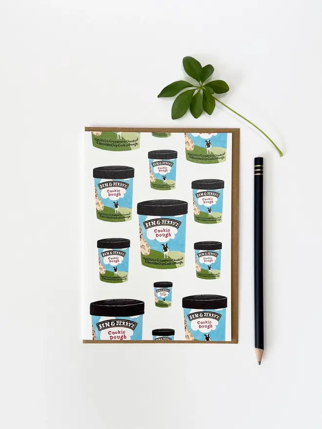 cookie dough ice cream illustrated card. card photographed against rose bush background.