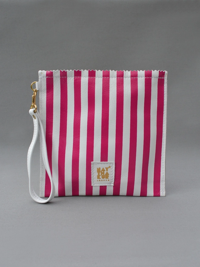 pink striped leather paper bag by Natthakur with a detachable wristlet