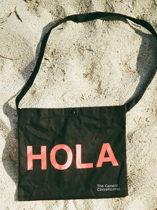 'Hola' Canvas Musette, on sand. 