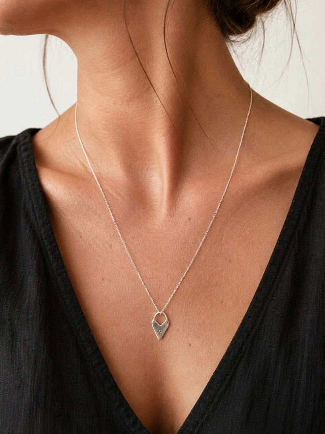 Hand made heart talisman charms made from 100% recycled sterling silver, cute gift for girlfriend or wife for Valentine's Day or Mother's Day. Send straight to your special someone. Made by Celina C Jewellery, a small business in the UK, find on Holly and Co.