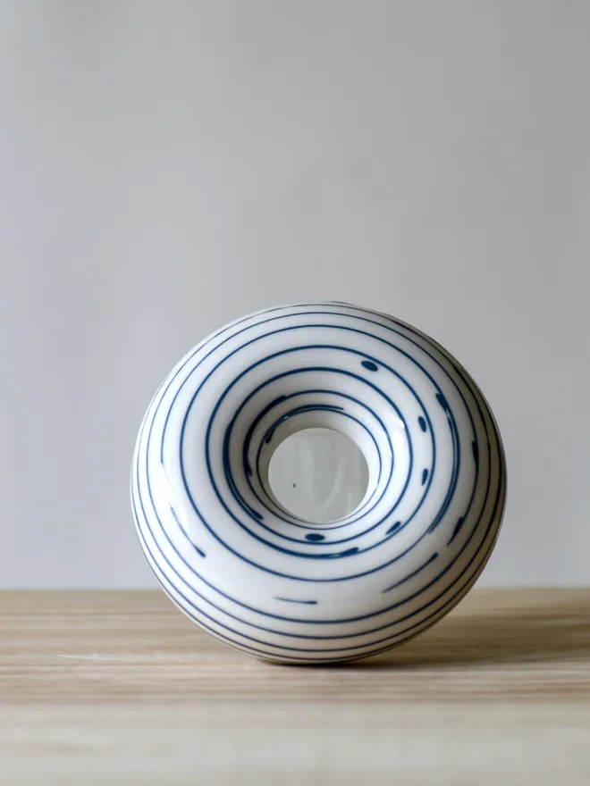 Avocado Planter White & Blue Handmade porcelain avocado planter with carved blue pattern, designed to hold an avocado seed for sprouting