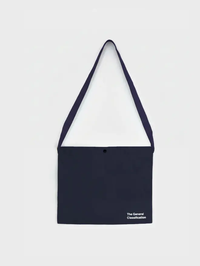 'Beer Bag' Musette Bag, against a grey background. 