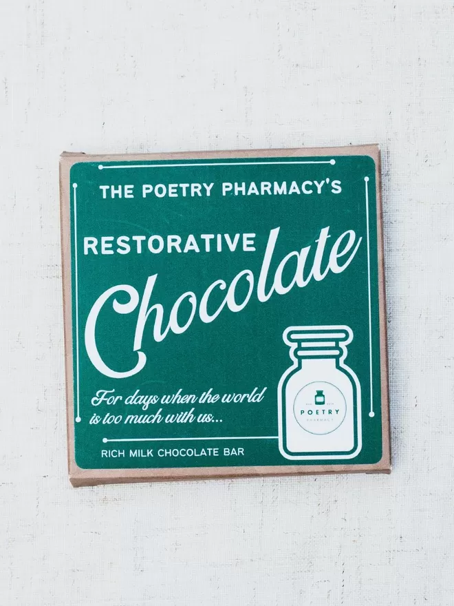 Restorative chocolate poetry pharmacy seen on a linen tablecloth