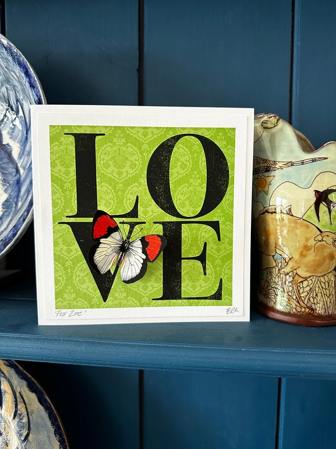 Love butterflygram displayed in home