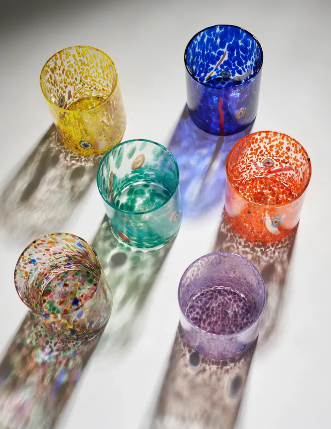 selection of six glass tumblers, in different vibrant colour patterns