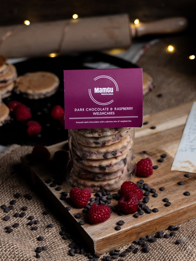 Dark Chocolate & Raspberry on a griddle and wooden board with loose ingredients 