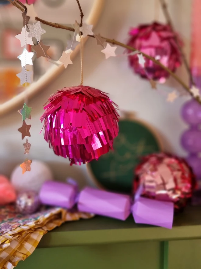 Bright pink metallic fringed bauble