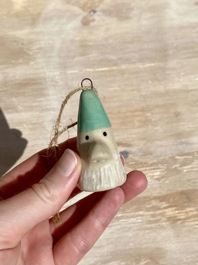 green ceramic gnome hanging decoration