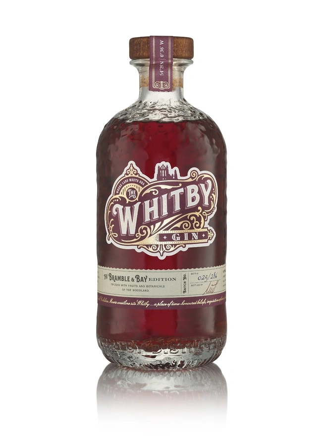 Bramble & Bay Edition Gin, a bottle of gin sitting on a plain white surface. 