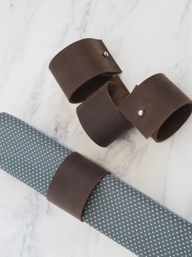 dark brown leather napkin rings