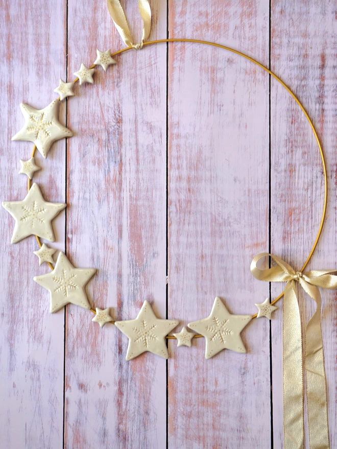 ceramic star wreath, christmas wreath, ceramic christmas wreath, star wreath, ceramic stars, christmas star decorations, christmas decor, christmas wall hangings, christmas unique home decor, Jenny Hopps Pottery