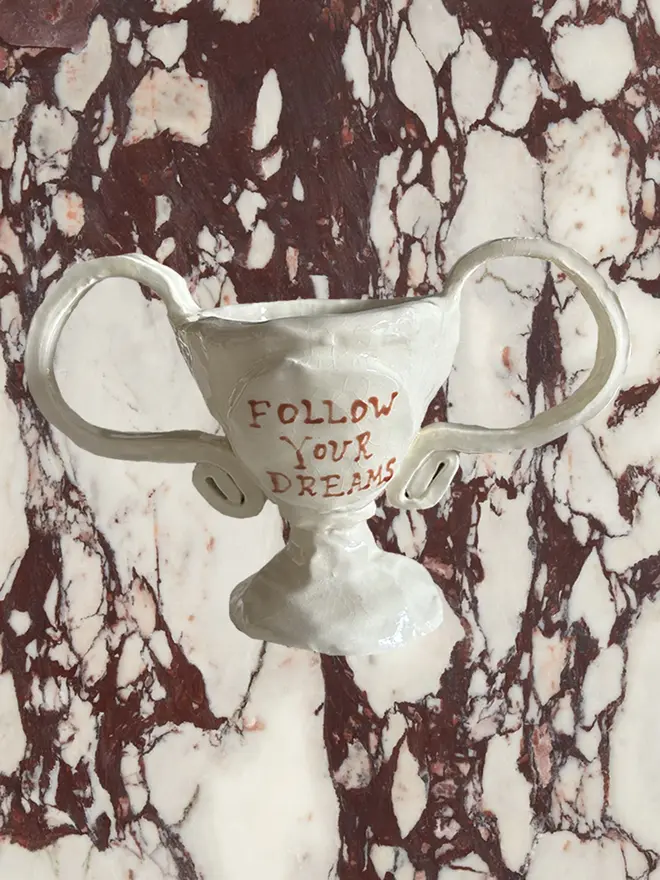 Follow your dreams mini ceramic trophy