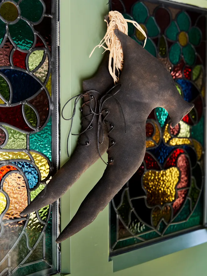 Large witches' shoes hanging decorations