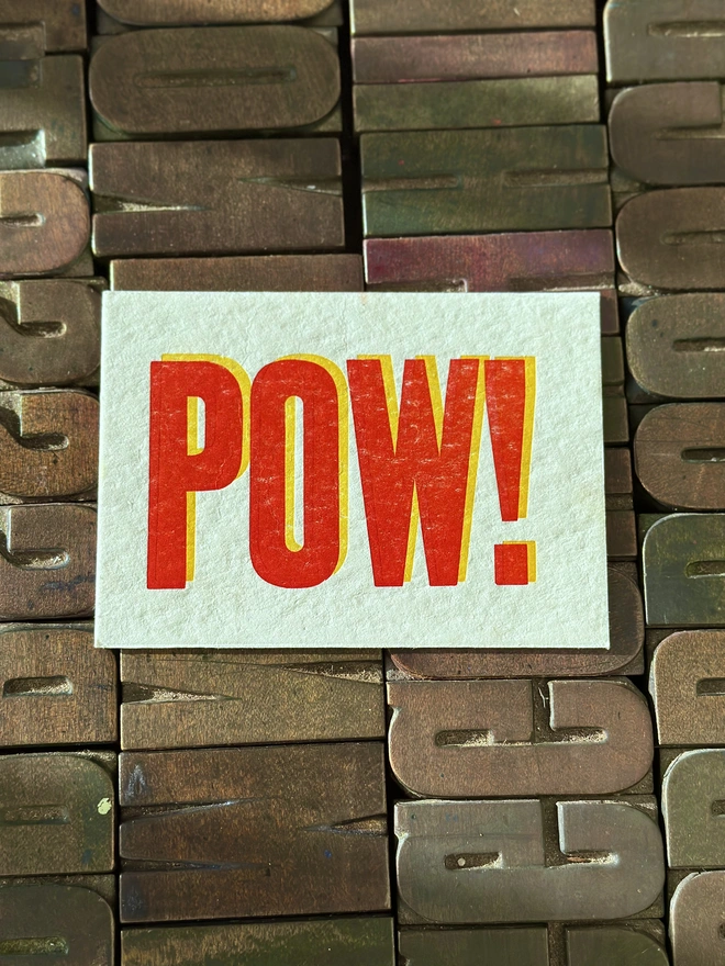 Pow! Typographical letterpress printed postcard, on wooden letters