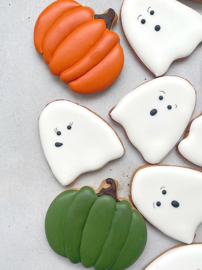 ✅ Alt Text for Images: “Hand-iced Halloween Ghost and Pumpkin biscuits, individually wrapped, in Vanilla or Gingerbread flavour
