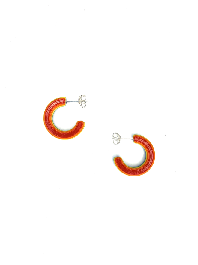 Rainbow Stripe mini hoop earrings, shown from the red side