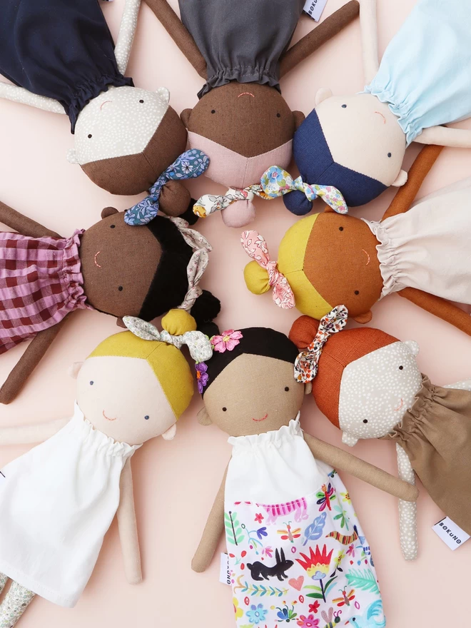 fabric girl doll in different skintones and outfits