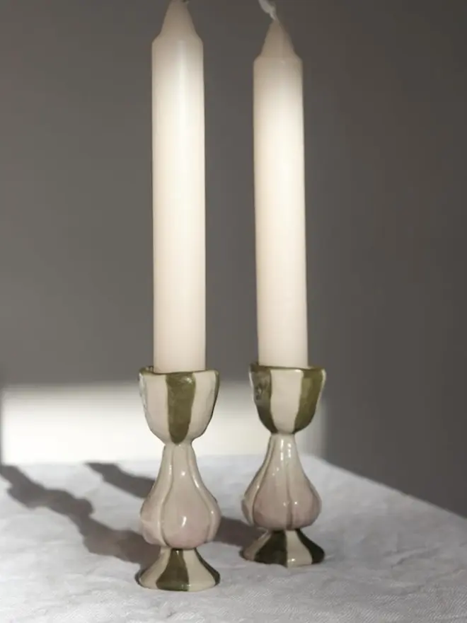 pair of two candlesticks with garlic design