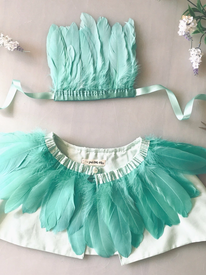 Mint green feather cape and feather headdress