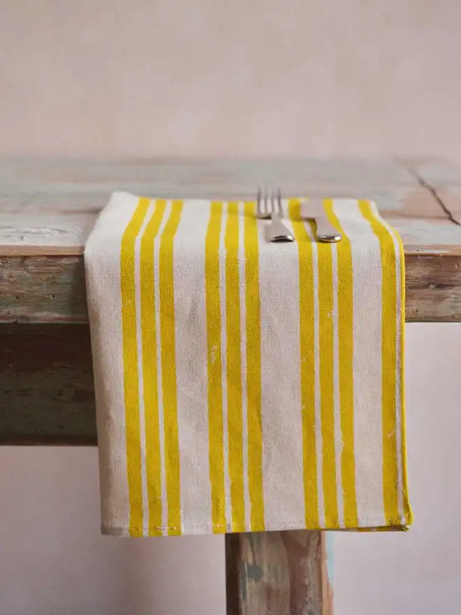 Triple yellow stripe napkin