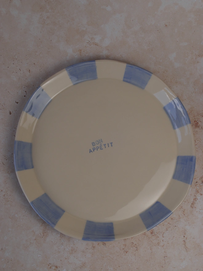 Blue striped ceramic Bon Appétit plate