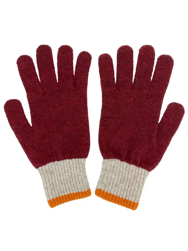 Block Lambswool Gloves, a pair of colourful gloves sitting on a plain white surface. 