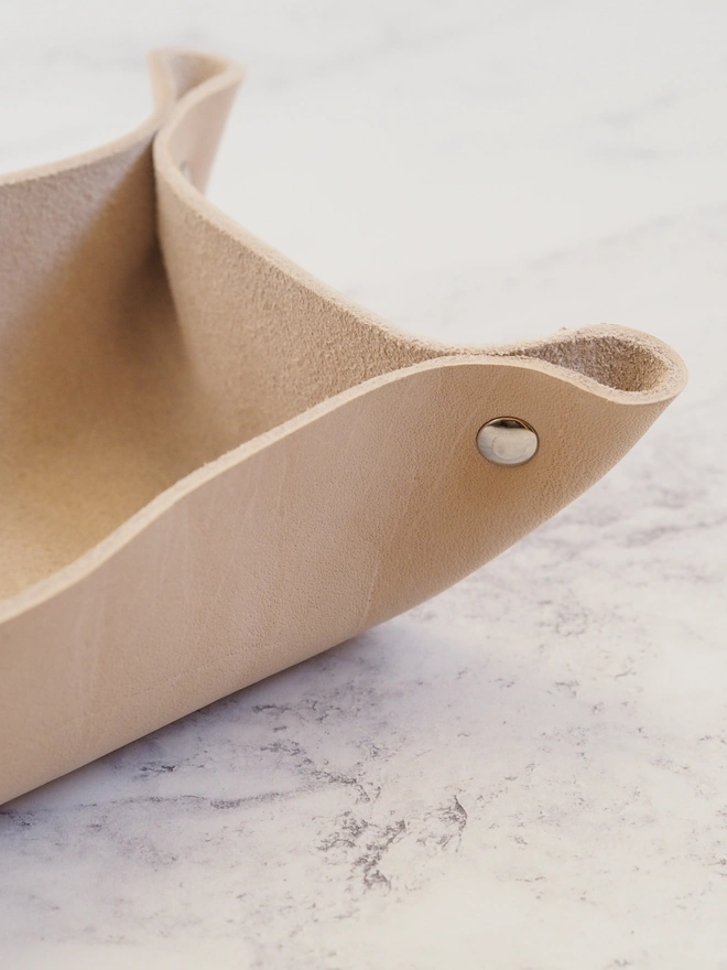 cream leather tray with silver rivets
