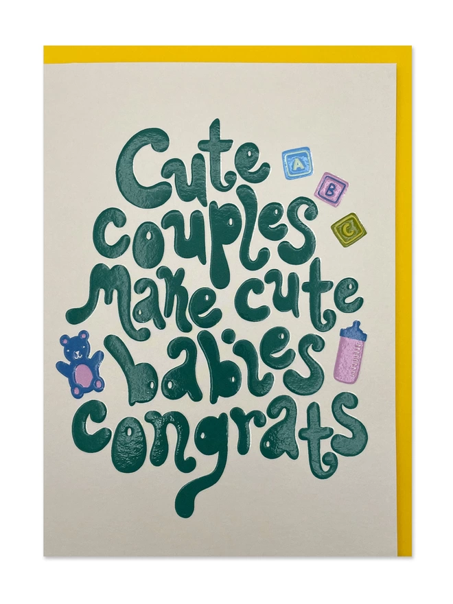 New baby card with fun ‘Cute couples make cute babies’ message in chunky 70’s inspired hand lettering surrounded by cute illustrated icons of building blocks, a babies bottle and bear. 