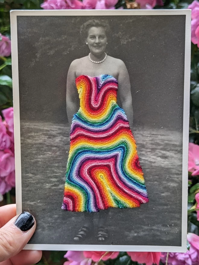 Rainbow coloured thread embroidered into vintage image of women in dress