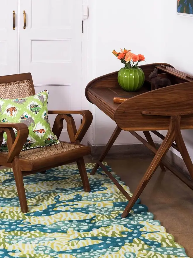 Big Cat Camo Hand Tufted Rug, a colourful rug sitting in a living room. 