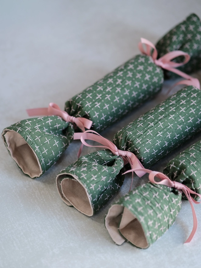 Self fill, reusable embroidered linen christmas cracker