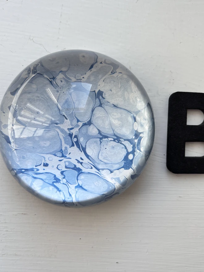 Small Paperweight. A paperweight in B