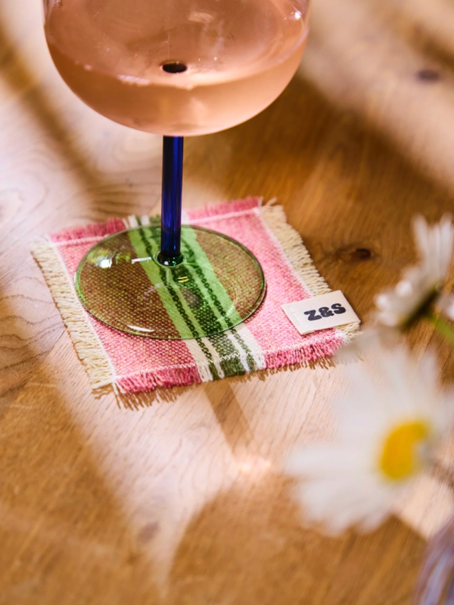Pink Sherbet Coasters. A pink and green coaster.