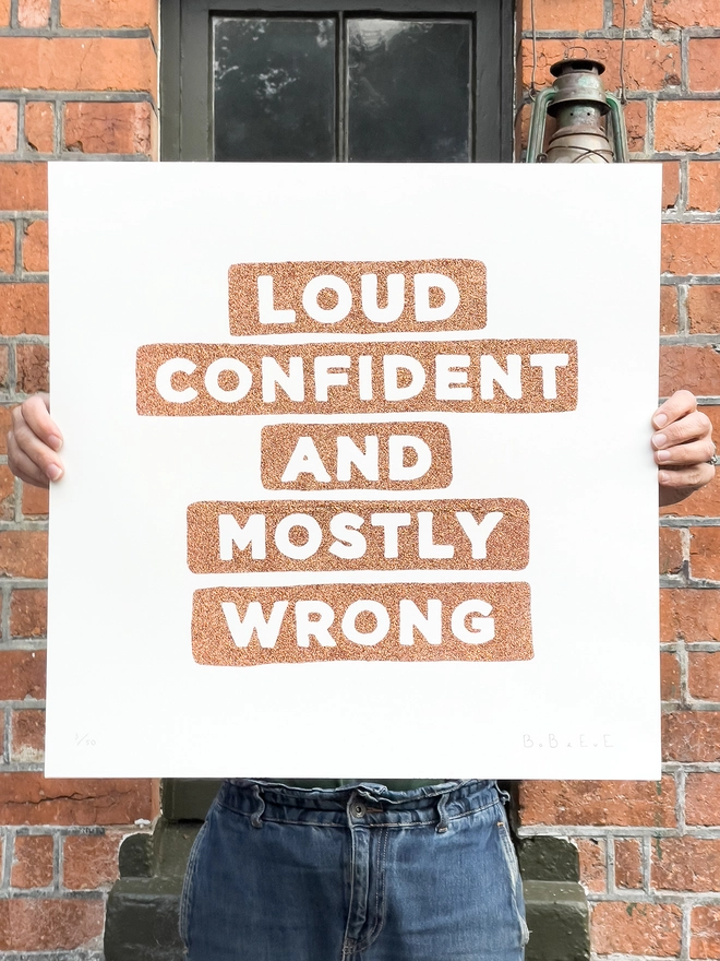 diamond dust screen print with type loud confident and mostly wrong