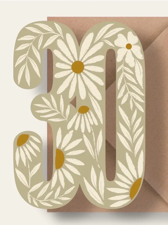 floral 30th birthday card. card shaped like 30 with illustrated daisies.