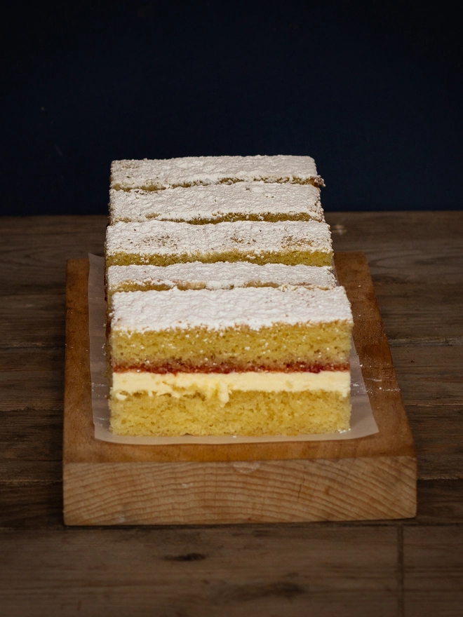 Five slices of uniformed Victoria Sponge Cake