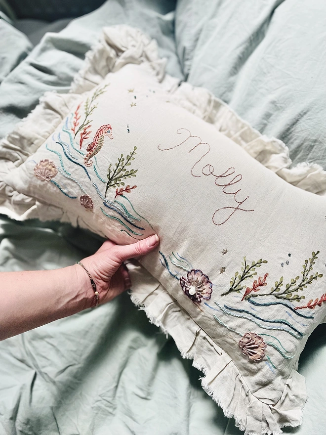 Under the sea, hand embroidered cushion on natural linen with personalised name 