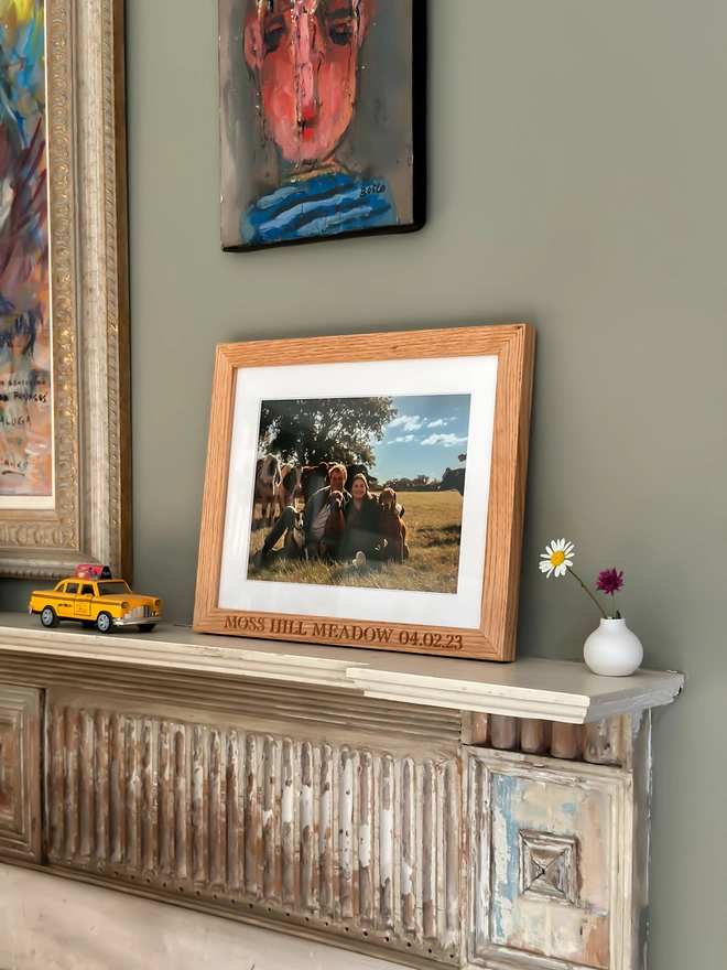 Frame on mantelpiece