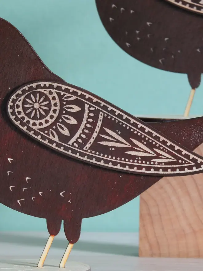 Standing Wooden Female Blackbird, Standing Wooden Female Blackbird, black wooden bird standing on  a wooden platform. 